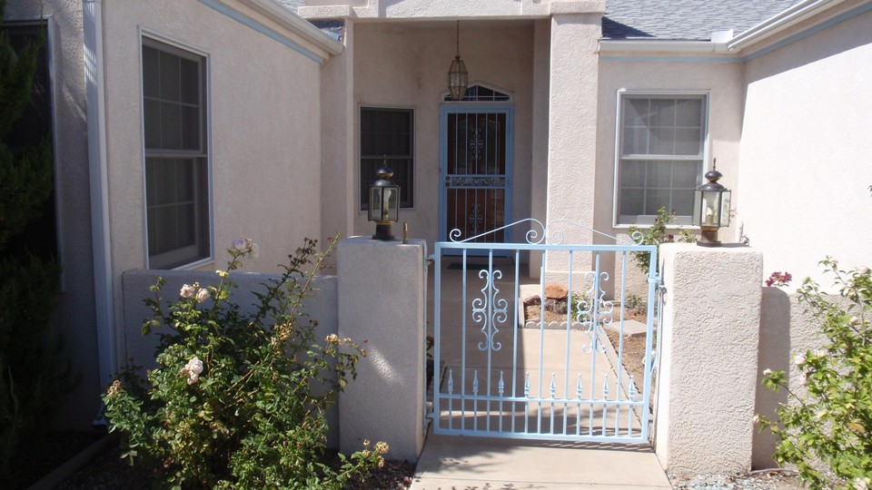 front entrance gated entrance to the front door foyer.