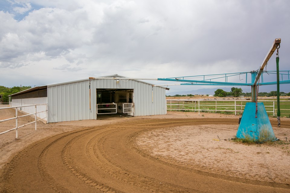 south end of 22 stall barn.  stalls are 12x12 and all have rubber mats.  6-horse walker