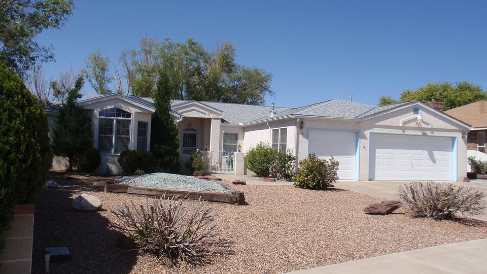 custom golf course home updated, spacious 3-bedroom, 2-bath home with a 3-car garage and southwest landscaping.