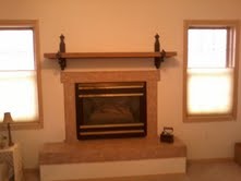 gas fireplace this gas light fireplace is the centerpiece of the den located on the opposite side of the kitchen.